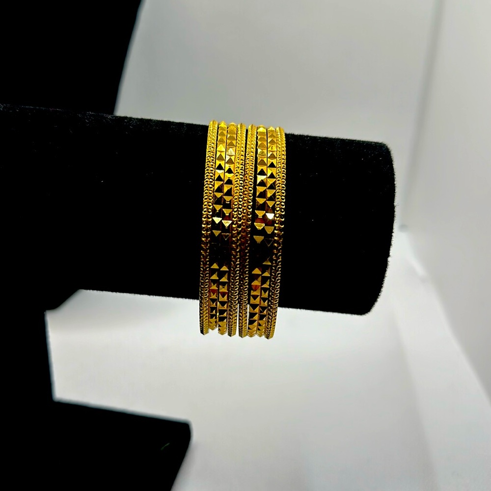 Gold like bracelets, set of 8